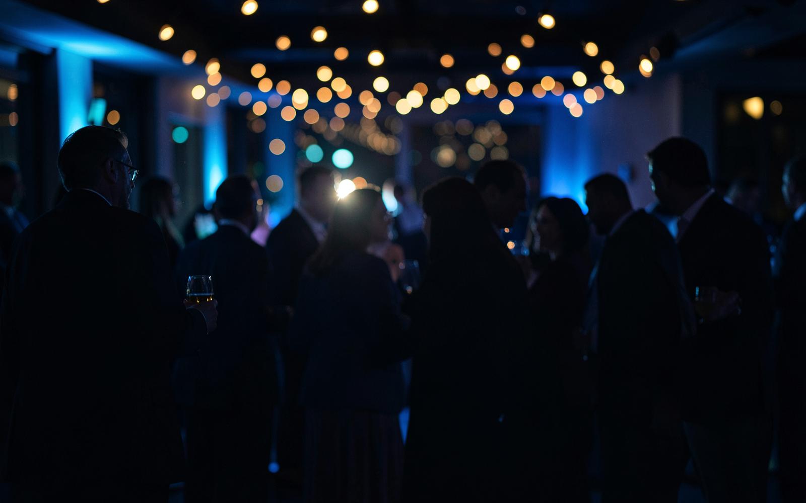 Placeholder visual of an evening industry networking event